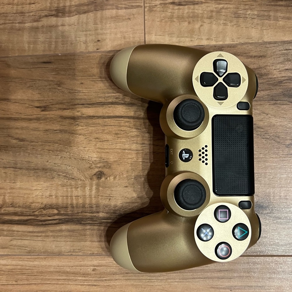PS4 controller | condition: barely used | color: gold